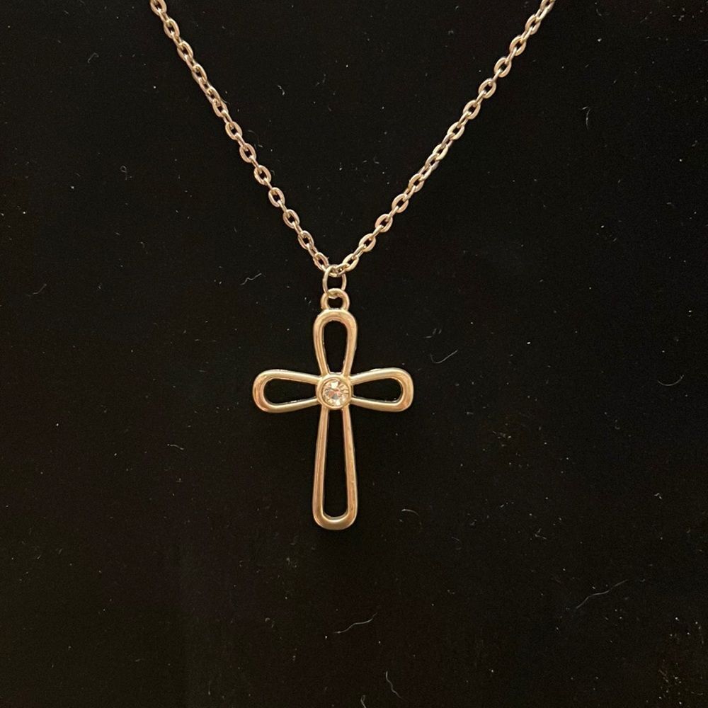 Handcrafted cross pendant on a 22 inch silver tone chain